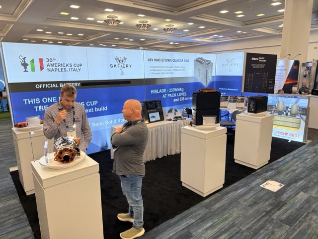 The Safiery stand at IBEX 2026, with the America's Cup official battery wall, the 48V BMG and HiBlade battery on display